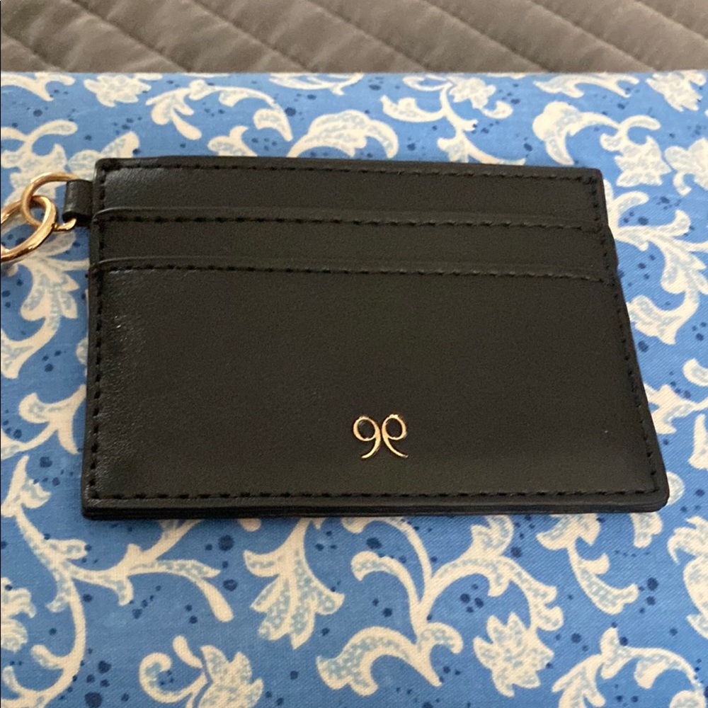 Sleek Black Card Holder with Gold Accent